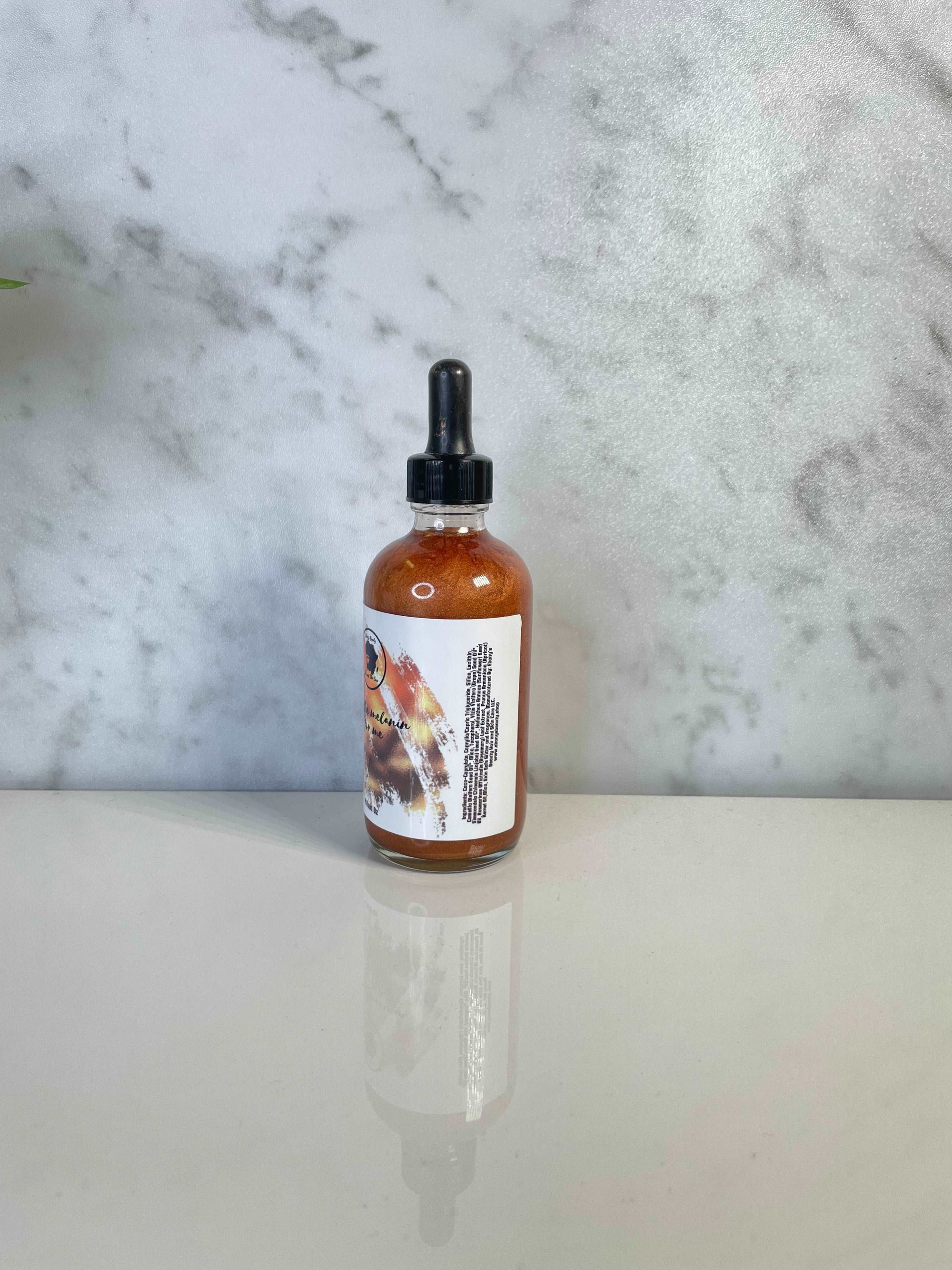 It's the Melanin for Me Shimmer Body Oil