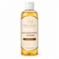 Snickerdoodle and Myrrh Body Oil in clear 8 oz bottle with white cap